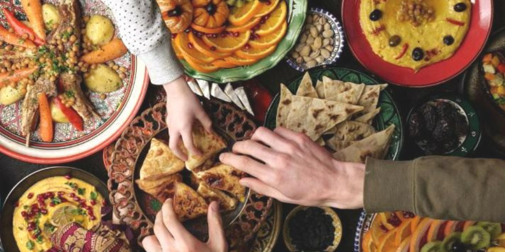 Hands eating global food
