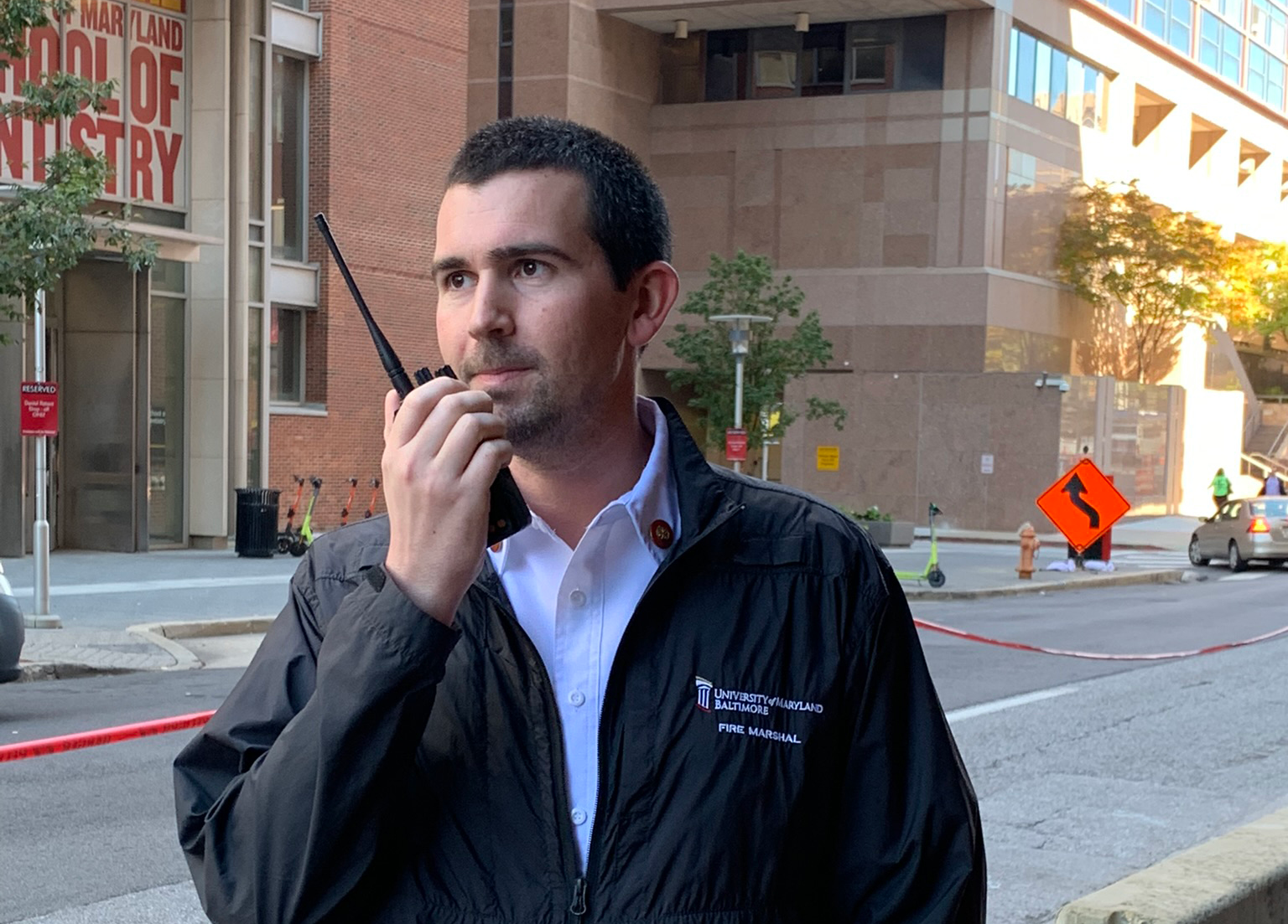 A person using a handheld radio