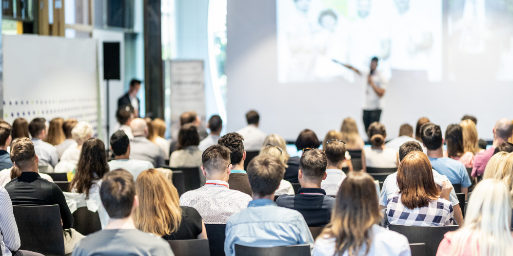 People attend a conference