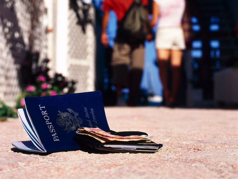 A dropped passport on the ground