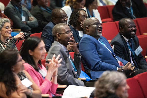 Attendees at the Summit listen to a speaker