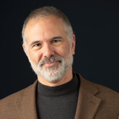 Headshot of Dr. George Jay Unick