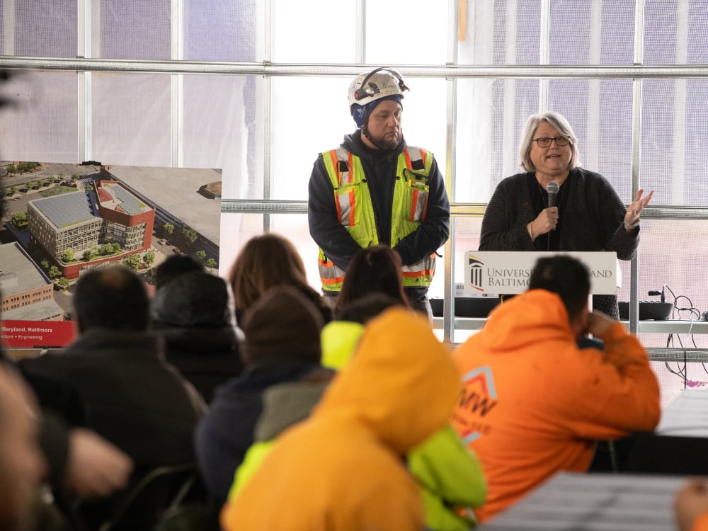 UMSSW Dean Judy Postmus addresses the crowd gathered for the UMSSW new building topping off ceremony. Photo by Matthew Paul D’Agostino