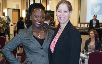 President's fellow Chinonye Donna Egbulem, left, stands with mentor Diane Marie M. St. George, PhD, assistant professor in the Department of Epidemiology and Public Health of the University of Maryland School of Medicine.