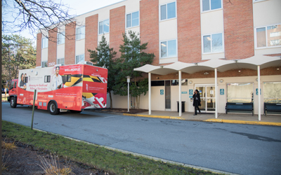 The Governor’s Wellmobile, operated by the UM School of Nursing, takes part in UMB's Interprofessional Care Transitions Clinic in Cheverly, Md., that is intended to improve patients' continuity of care.
