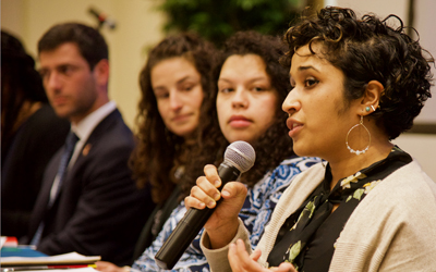 The president's fellows presented their paper on gun violence at a symposium on April 8.