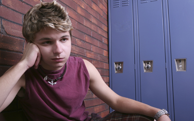 Sulking teenager in school