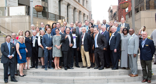 DPOB Board Chair Jay A. Perman, MD, gives a thumbs up amid the other board members at the 2017 annual meeting.