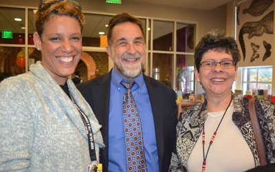 Henriette Taylor, MSW, LGSW, and Dean Richard P. Barth, PhD, MSW, of the School of Social Work; and Clemencia Vargas, DDS, Phd, of the School of Dentistry, were representing UMB at an event to launch the workforce program.