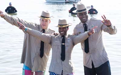 Lt. Tom Leone, Sgt. Matthew Johnson and Pfc. Edouardo Edouazin go in for a second dip in the 2018 MSP Polar Bear Plunge.