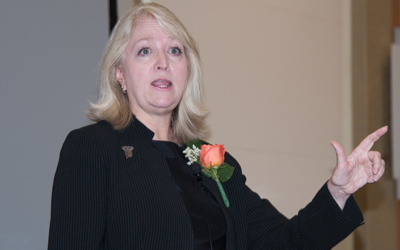 Paula Monopoli, JD, the Sol & Carlyn Hubert Professor of Law at the University of Maryland Francis King Carey School of Law and founding director of the Women, Leadership and Equity Program, addresses attendees of the University System of Maryland Women's Forum in her keynote address, 