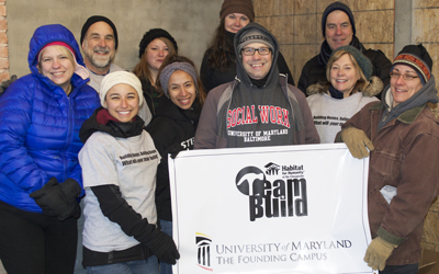 Students and staff from the University of Maryland School of Social Work participate in a Team Build for Habitat for Humanity of the Chesapeake in Sandtown-Winchester.