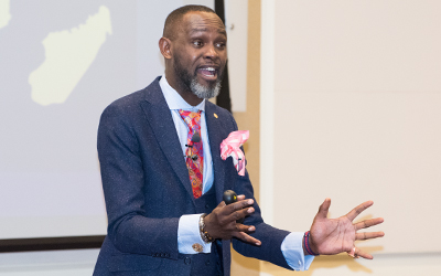 Derreck Kayongo, CEO of the National Center for Civil and Human Rights, and founder of Global Soap Project, speaks at the Presidents Panel on Politics and Policy. 