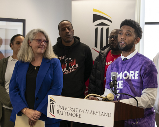 Dr. Kyla Liggett-Creel, Baltimore Mayor Brandon Scott, and Embrace Resource Center partners celebrate the opening of the center’s new space in January 2024.