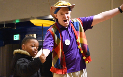 Greg May, Port Discovery’s performing arts manager, excited the students at James McHenry Elementary Middle School with a spinning plate trick.