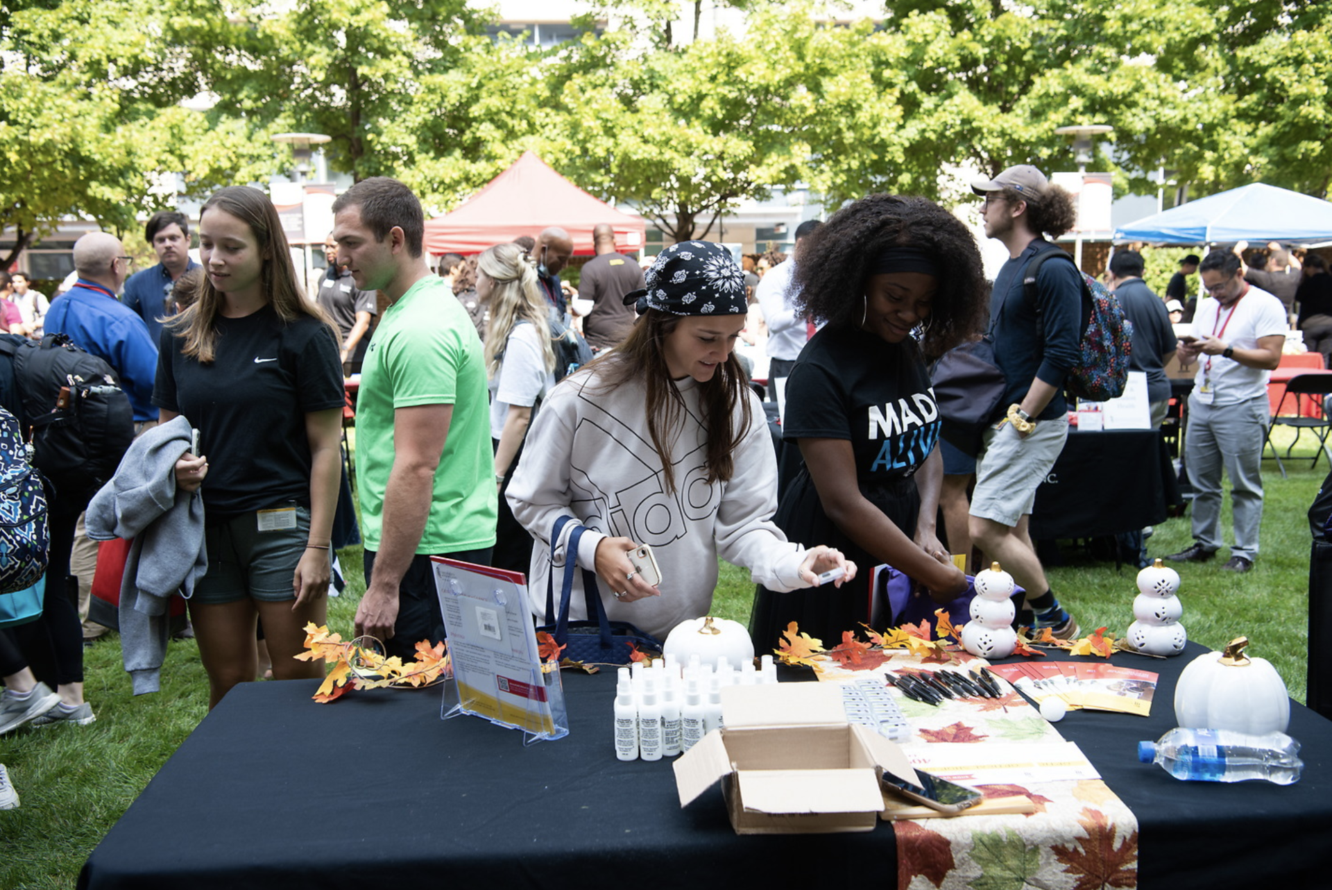 Students checking out a table at the Campus Involvement Fair