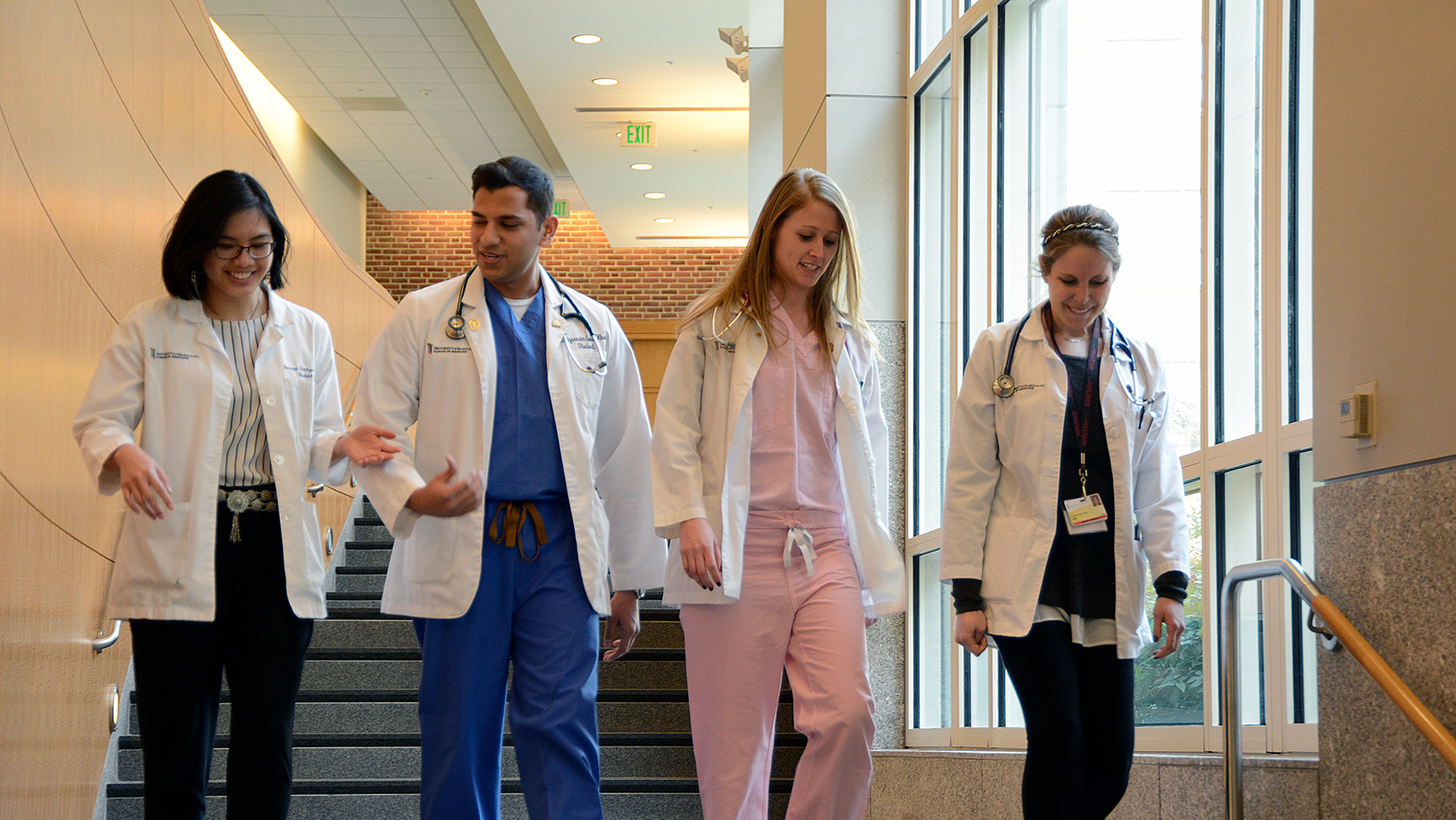 med students walking down the hallway