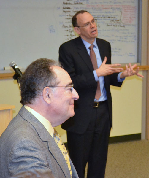 Dr. Perman and James L. Hughes